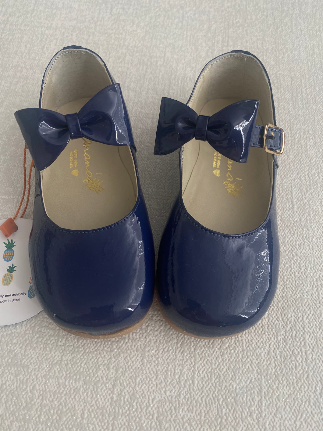 Navy patent leather bow shoes